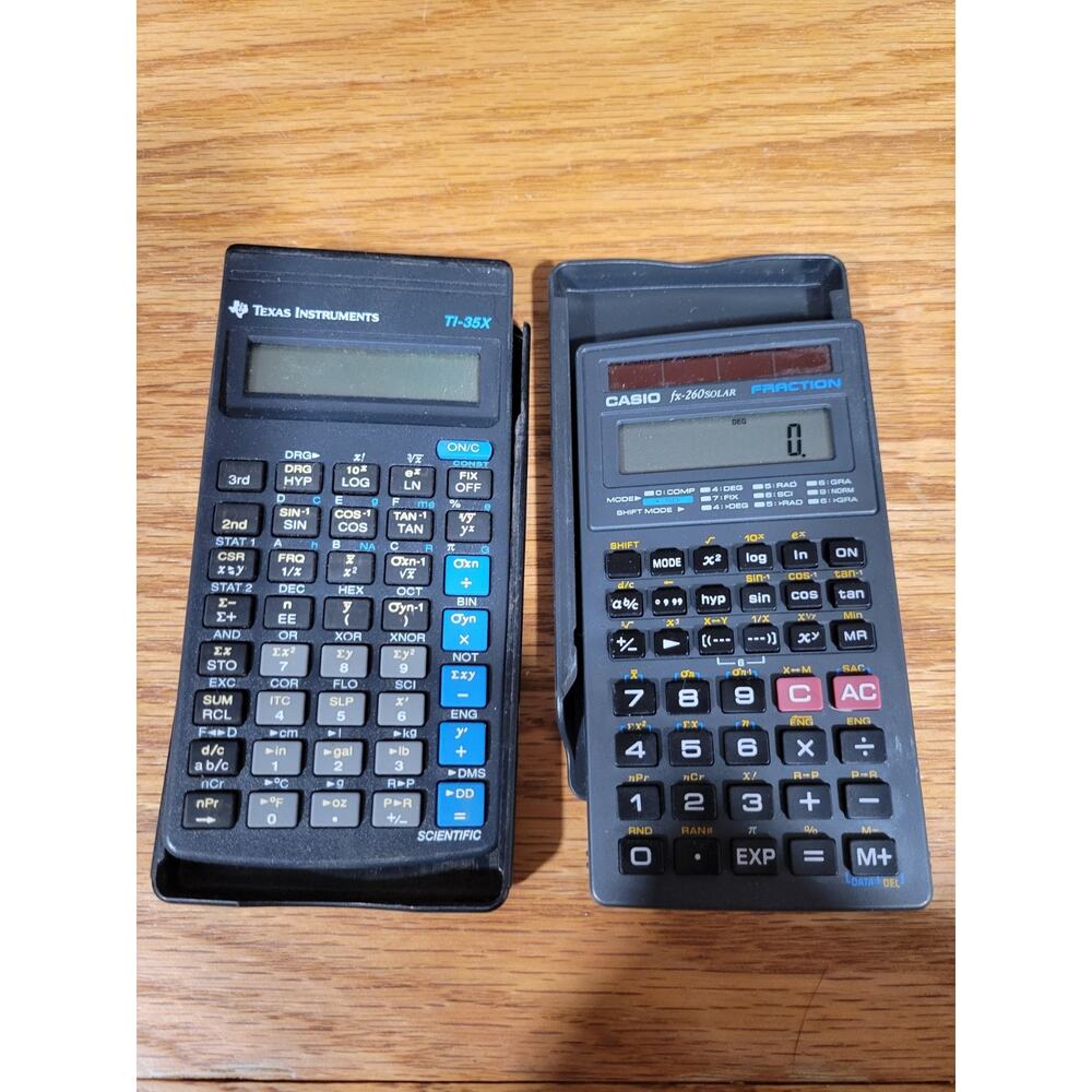 Pair of vintage texas Instrument and Casio calculators with cases
